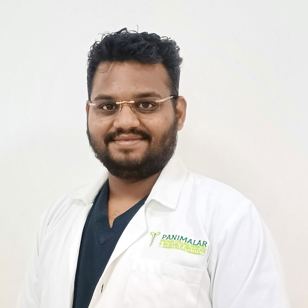 Dr. Vignesh K M